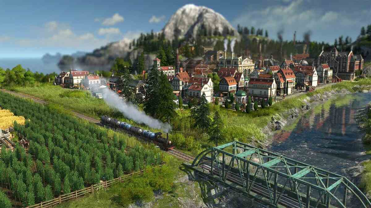 A steam train travels along tracks beside a river in Anno 1800