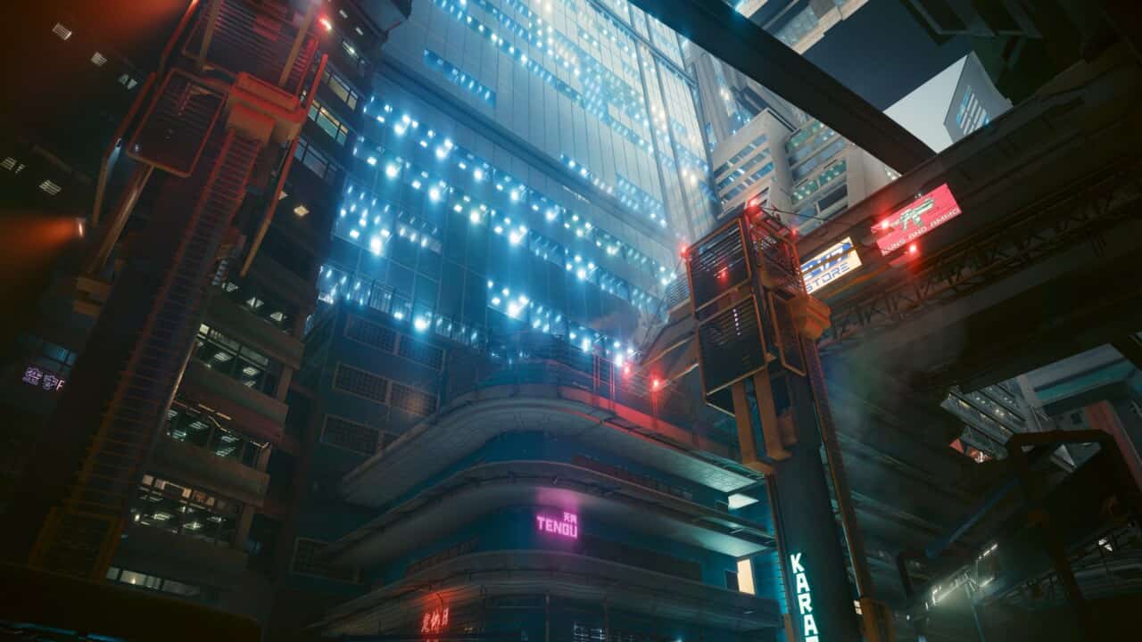Best Cyberpunk 2077 builds for 2.0: skyscrapers from below in Night City.