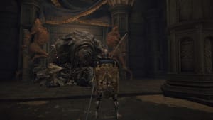 Elden Ring Deathroot locations: A player standing in front of Gurranq at the Bestial Sanctum.