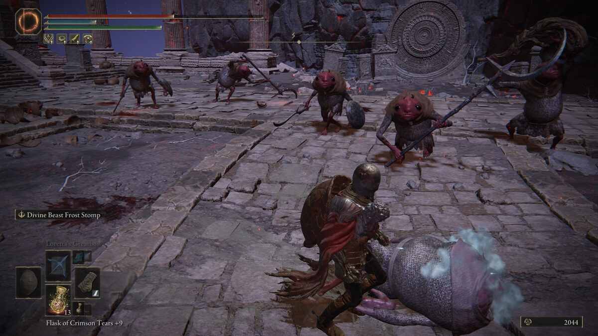 Elden Ring has perfected the disgusting little freak: A player standing in front of a group of red, frog-like enemies in a stony area.