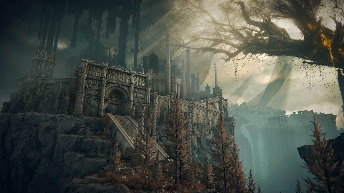 Elden Ring Shadow of the Erdtree preview: a large, ornate stone castle sits atop a rocky cliff surrounded by leafless trees.