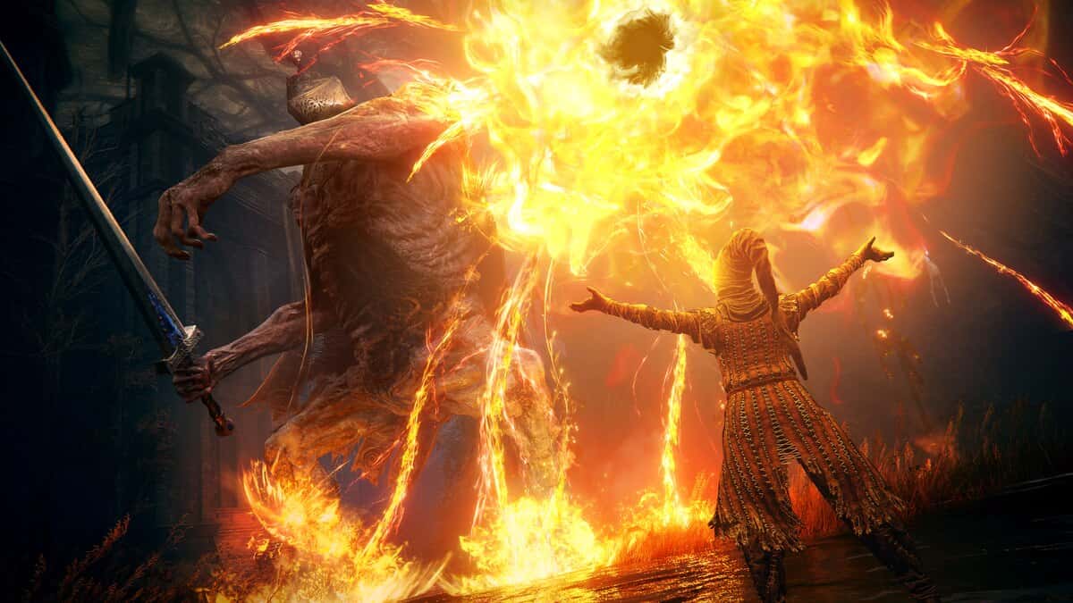 Elden Ring Shadow of the Erdtree preview: figure summons flames while battling a towering creature.