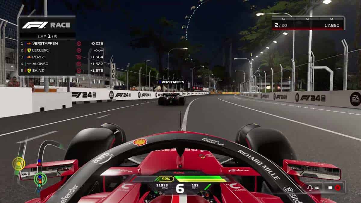 F1 24 review: The cockpit of a Ferrari F1 car behind Max Verstappen in the Singapore Grand Prix.