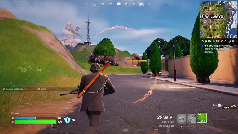 Fortnite where to find a War Bus: A player approaching a War Bus across a grassy hill in Fortnite.
