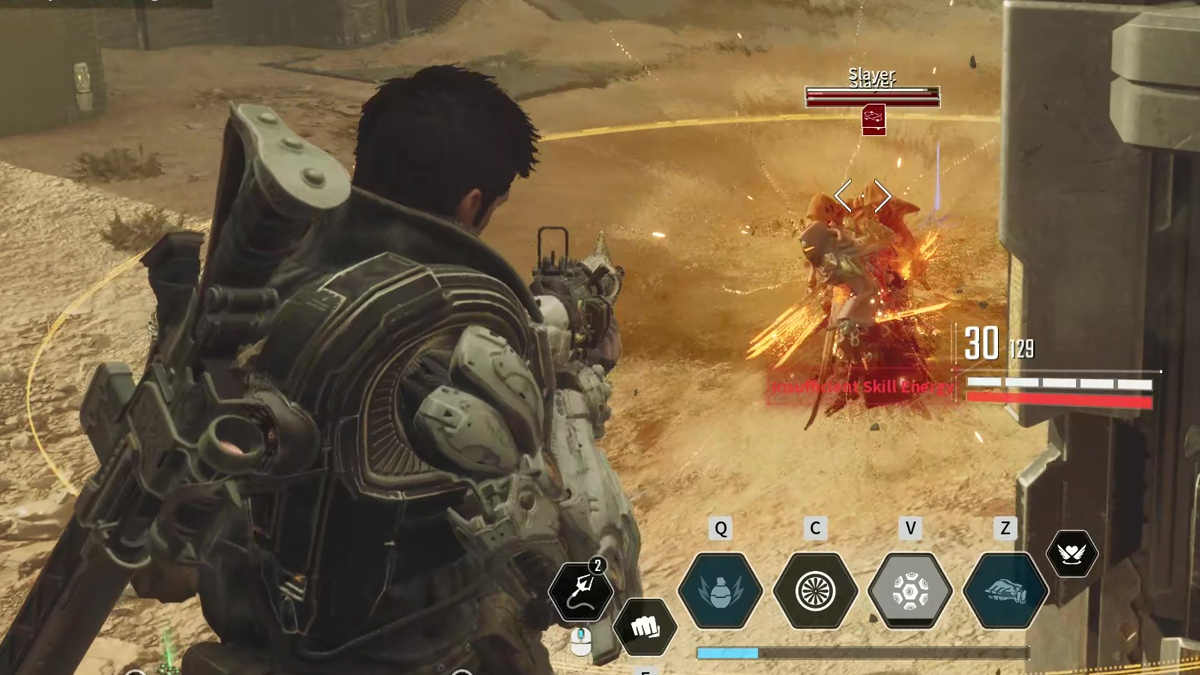A picture of a marine throwing a grenade at aliens on a sandy dune.
