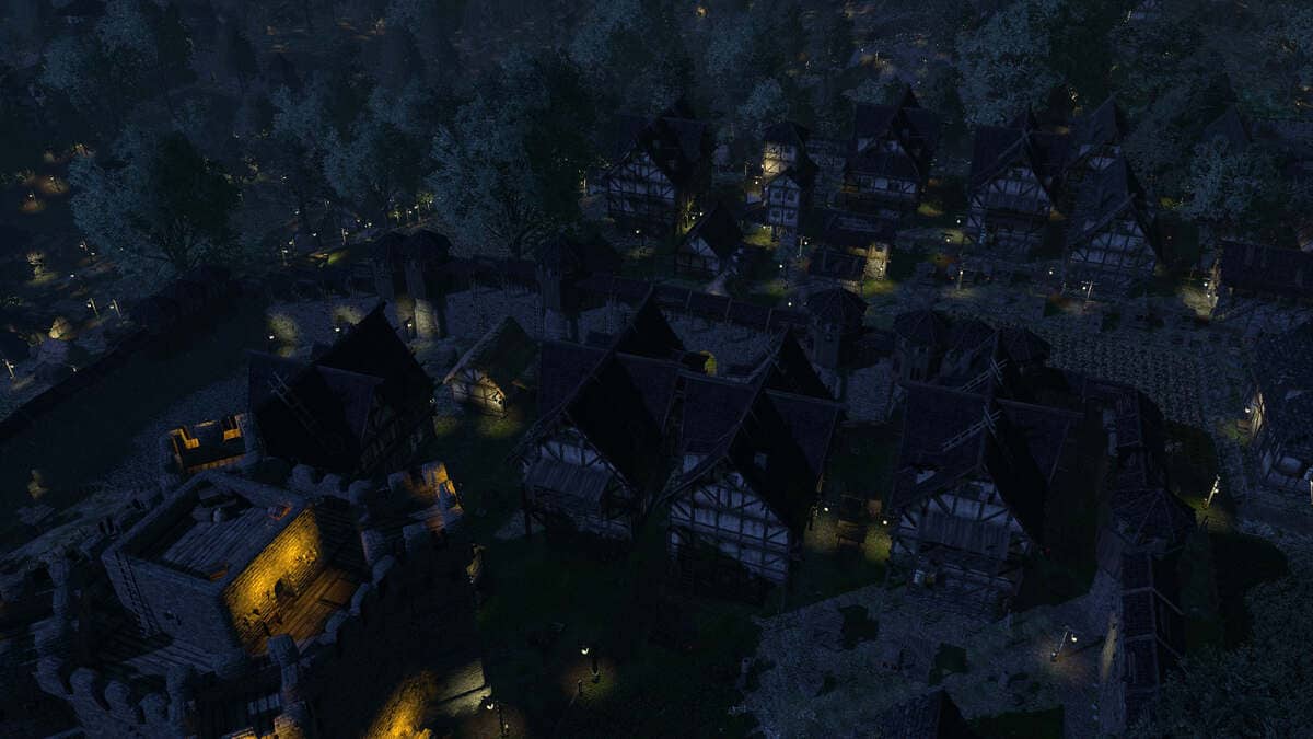 An aerial view of the medieval-style village at night in Life is Feudal Forest Village