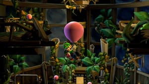 luigi's mansion hd release date - a man wearing green holds on to a balloon