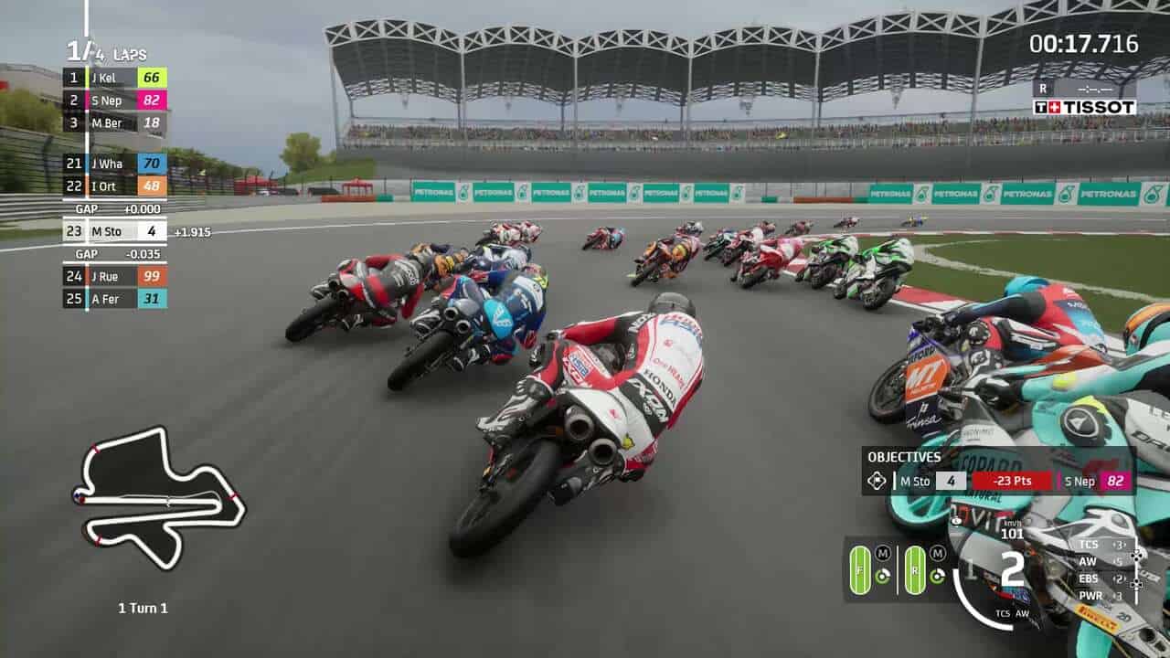  MotoGP 24 review: A rider among a group of other riders rounding a corner of Sepang Circuit in Malaysia.