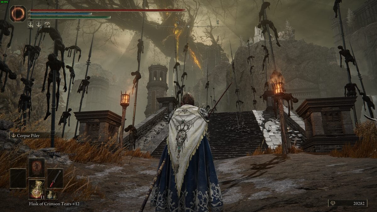 Elden Ring Shadow of the Erdtree review: Tarnished walking into Castle Ensis.