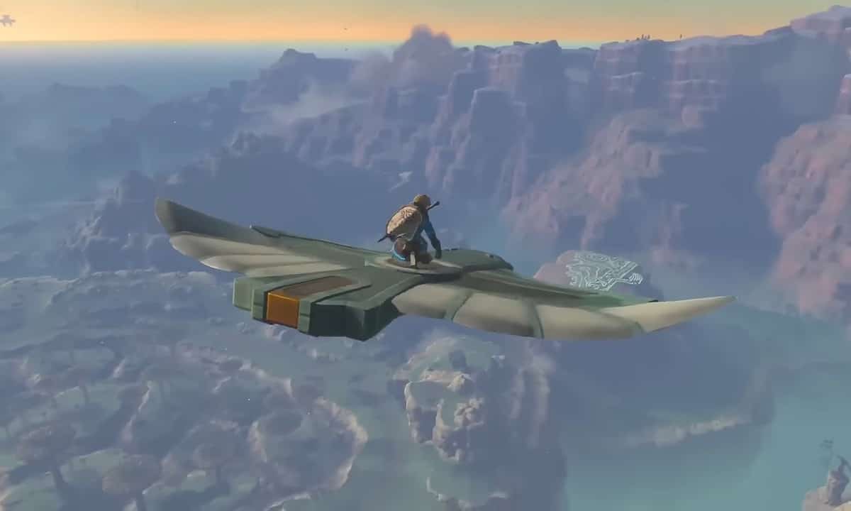 Tears of the Kingdom DLC: Link flying on a stone bird with a plateau with glowing markings on it below.
