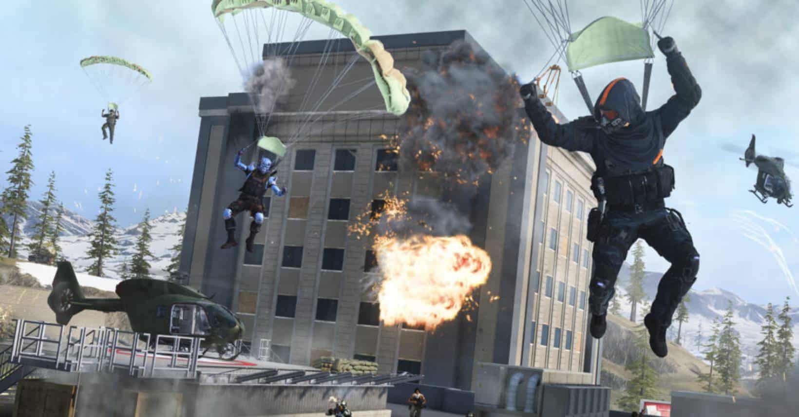 Paratroopers in action amidst an explosion from a building with a helicopter and jet in the background of a warzone.